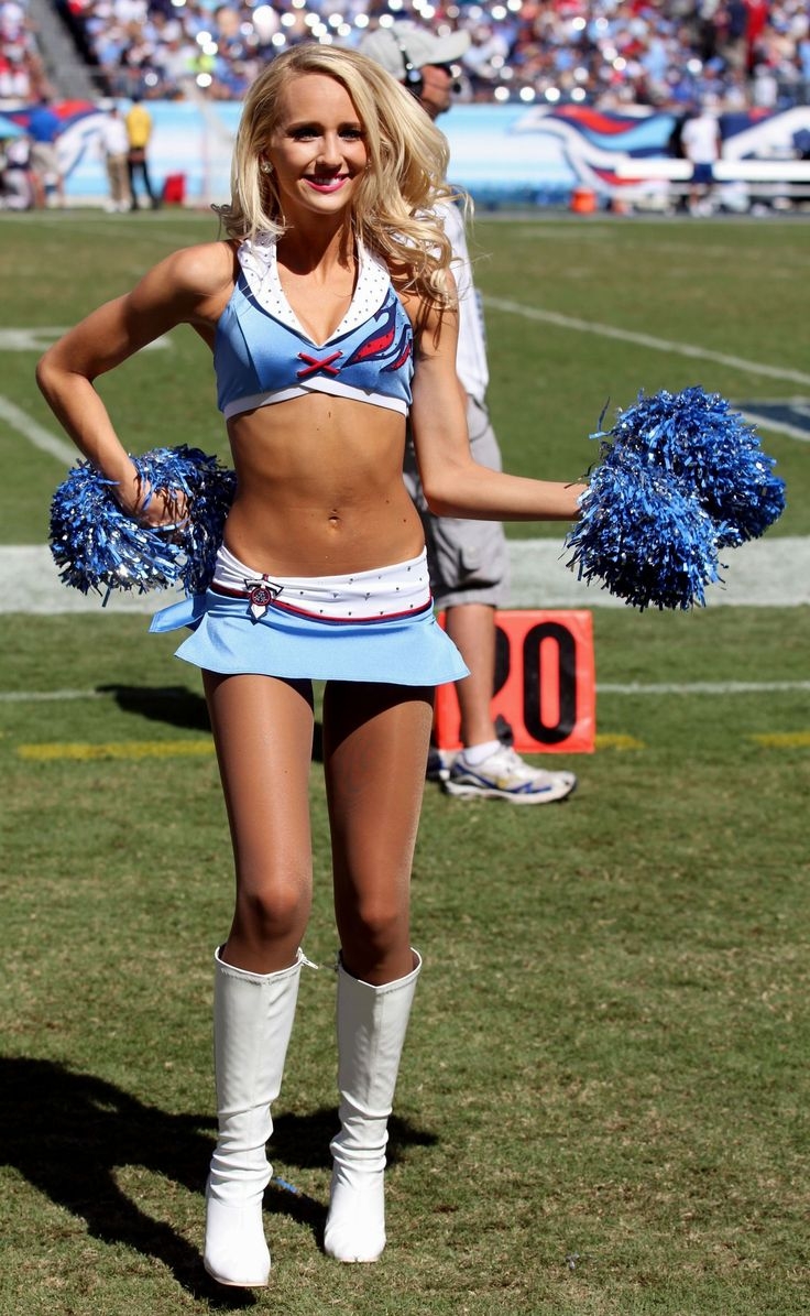 Blonde Cheerleader wearing Tan Sheer Nylon Pantyhose, White Boots and Blue Micro Skirt